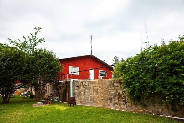 exterior space with a lawn