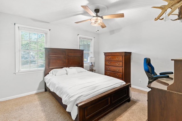 4065 S Goshen Lake Dr, Augusta, GA 30906 - carpeted bedroom featuring baseboards, multiple windows, and ceiling fan