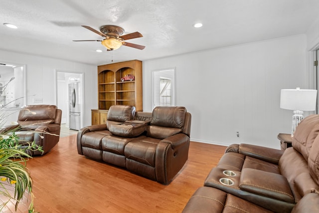 4065 S Goshen Lake Dr, Augusta, GA 30906 - living room with light wood-style flooring, ceiling fan, and recessed lighting