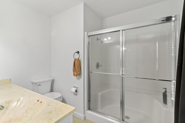 4065 S Goshen Lake Dr, Augusta, GA 30906 - full bathroom featuring toilet, vanity, baseboards, and a shower stall