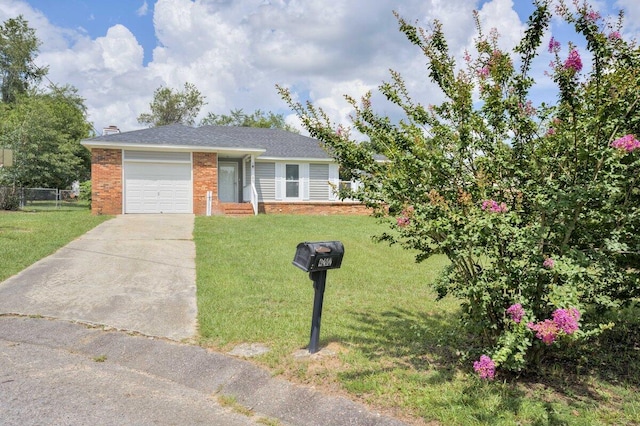 single story home with a garage and a front lawn