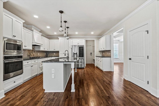304 Ash Ct, Evans, GA 30809 - kitchen featuring crown molding, a sink, stainless steel appliances, backsplash, and custom exhaust hood