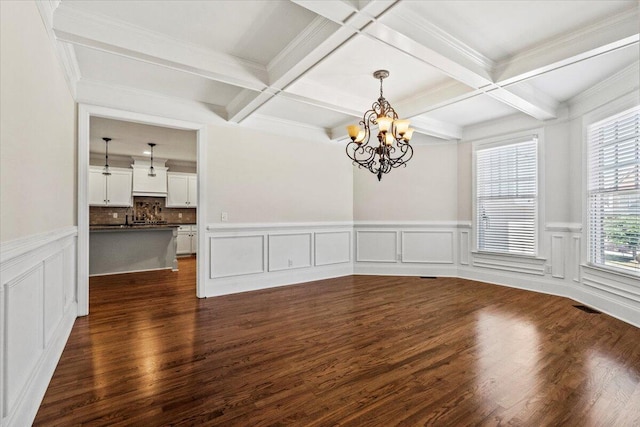 304 Ash Ct, Evans, GA 30809 - unfurnished dining area featuring beamed ceiling, an inviting chandelier, and coffered ceiling