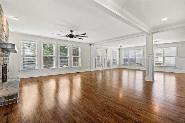 304 Ash Ct, Evans, GA 30809 - unfurnished living room with crown molding, a ceiling fan, a stone fireplace, and wood finished floors