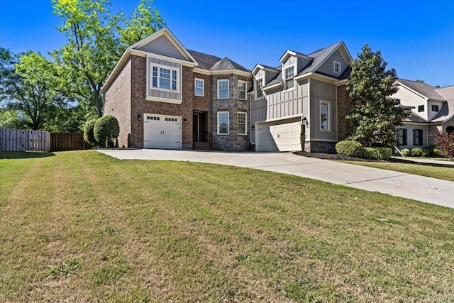 304 Ash Ct, Evans, GA 30809 - view of front of house with fence, a front lawn, brick siding, a garage, and driveway