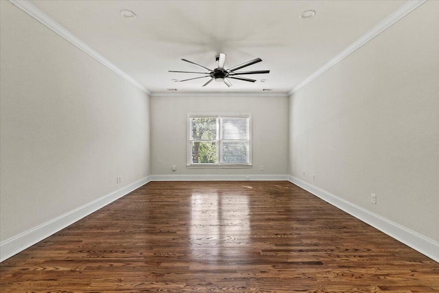 304 Ash Ct, Evans, GA 30809 - spare room with crown molding, dark wood finished floors, ceiling fan, and baseboards