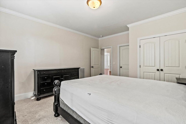 304 Ash Ct, Evans, GA 30809 - carpeted bedroom featuring crown molding, baseboards, visible vents, and a closet