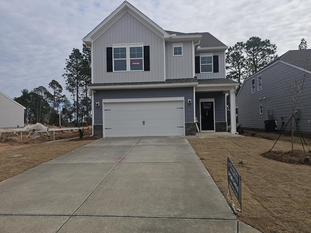 view of front of property featuring a garage