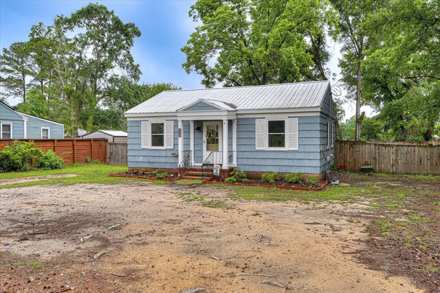 2325 Henry Cir, Augusta, GA 30906 - view of front of home featuring a fenced backyard and metal roof