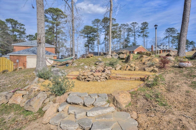 view of yard featuring fence