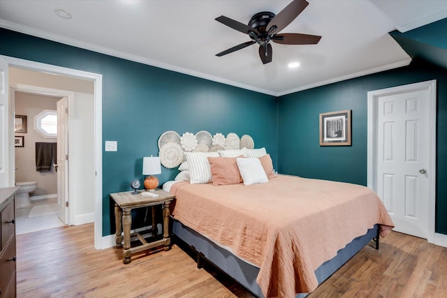 bedroom featuring a ceiling fan, baseboards, crown molding, and light wood finished floors