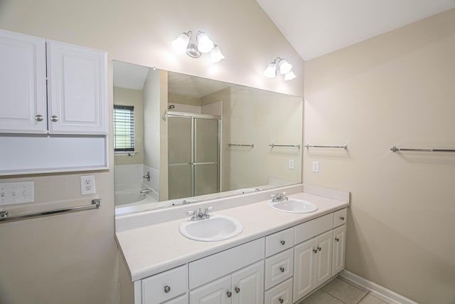 944 Cannock St, Grovetown, GA 30813 - bathroom with double vanity, a stall shower, a bath, tile patterned flooring, and lofted ceiling