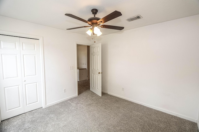 944 Cannock St, Grovetown, GA 30813 - unfurnished bedroom with light colored carpet, a closet, and ceiling fan