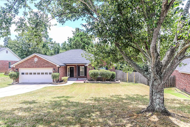 944 Cannock St, Grovetown, GA 30813 - view of front of home with an attached garage, concrete driveway, and brick siding