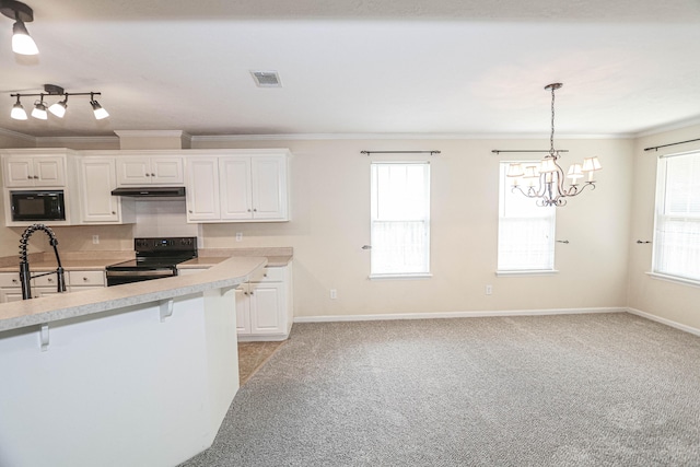 944 Cannock St, Grovetown, GA 30813 - kitchen with black appliances, ornamental molding, light carpet, light countertops, and a chandelier