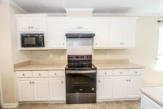 944 Cannock St, Grovetown, GA 30813 - kitchen with stainless steel electric range oven, under cabinet range hood, black microwave, crown molding, and white cabinetry