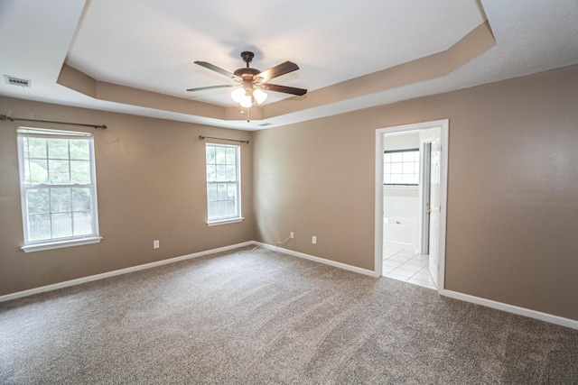 944 Cannock St, Grovetown, GA 30813 - empty room with light colored carpet, a raised ceiling, and a ceiling fan
