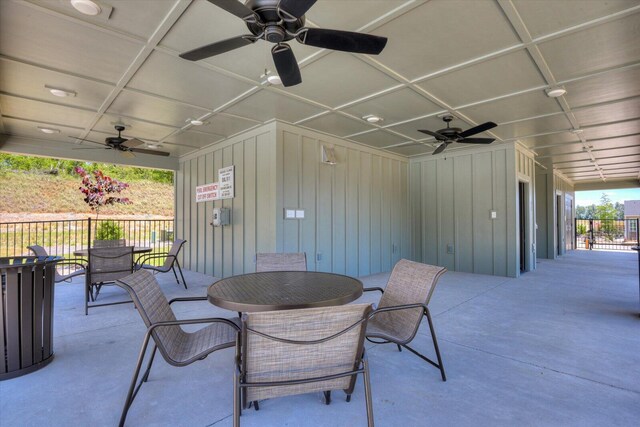 view of patio / terrace featuring outdoor dining area and fence