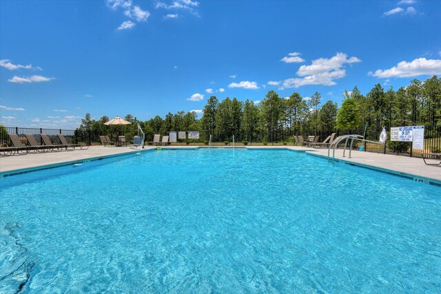 community pool with fence