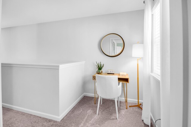 office area with carpet floors, a wealth of natural light, and baseboards