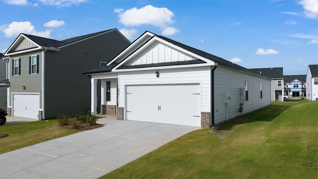 view of front of home with a front lawn, a garage, board and batten siding, and concrete driveway