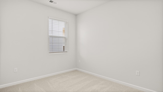 unfurnished bedroom featuring carpet flooring, baseboards, and a closet