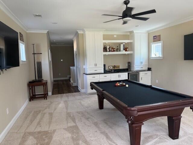2120 Shell Point Ct, Harlem, GA 30814 - recreation room with beverage cooler, ornamental molding, ceiling fan, billiards, and light colored carpet