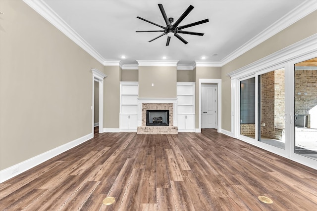 2120 Shell Point Ct, Harlem, GA 30814 - unfurnished living room featuring a brick fireplace, dark wood-style flooring, ornamental molding, baseboards, and a ceiling fan