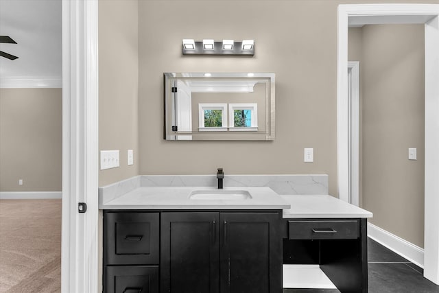 2120 Shell Point Ct, Harlem, GA 30814 - bathroom with crown molding, vanity, and baseboards