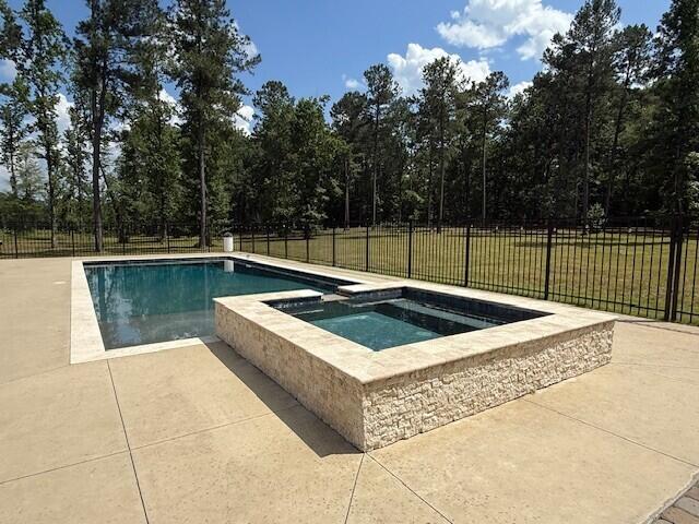 2120 Shell Point Ct, Harlem, GA 30814 - view of swimming pool featuring a patio and a pool with connected hot tub
