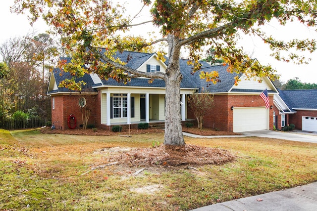 view of front facade with a porch and a front lawn