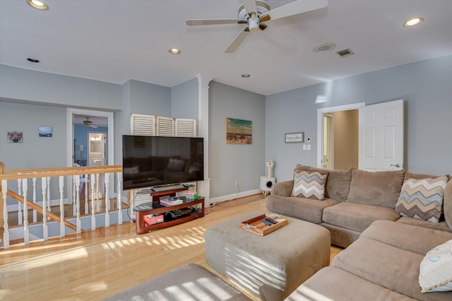 living room with ceiling fan, recessed lighting, visible vents, baseboards, and light wood finished floors