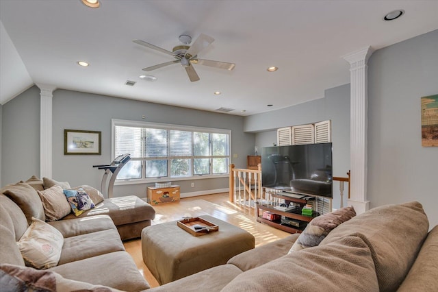 living room featuring ornate columns, ceiling fan, visible vents, and recessed lighting