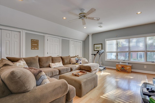 living room with baseboards, recessed lighting, a ceiling fan, and light wood-style floors