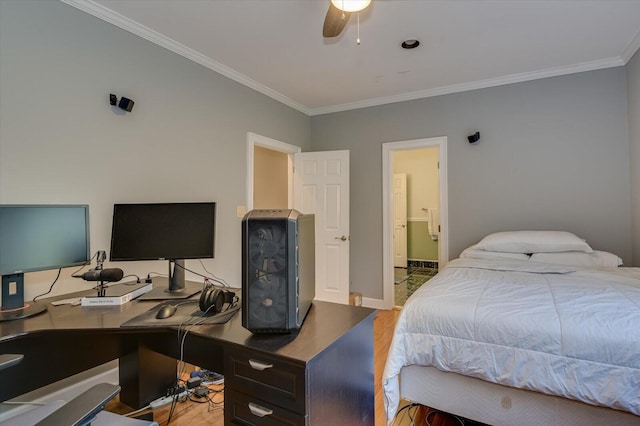 bedroom with baseboards, a ceiling fan, ensuite bath, ornamental molding, and light wood-type flooring