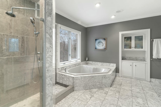 full bathroom with a garden tub, marble finish floor, ornamental molding, and a shower stall