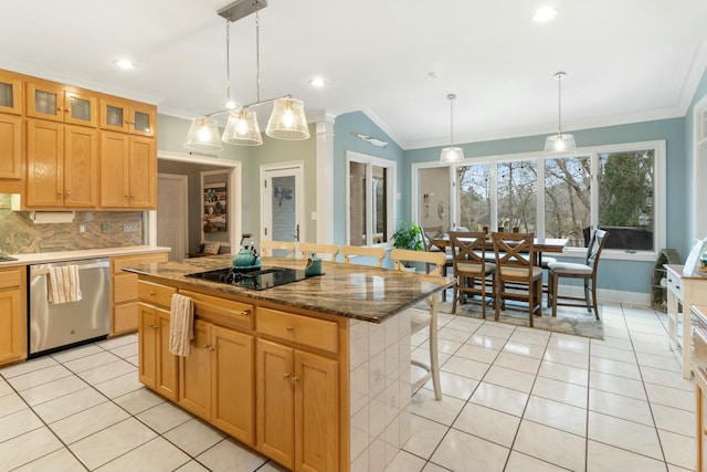 kitchen with hanging light fixtures, a kitchen island, a breakfast bar, and dishwasher