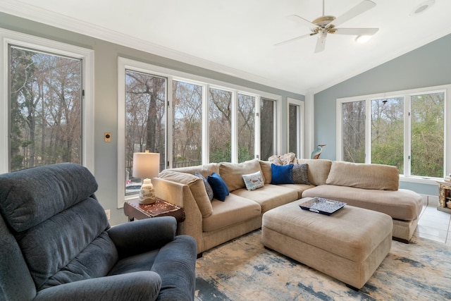 sunroom featuring lofted ceiling and ceiling fan