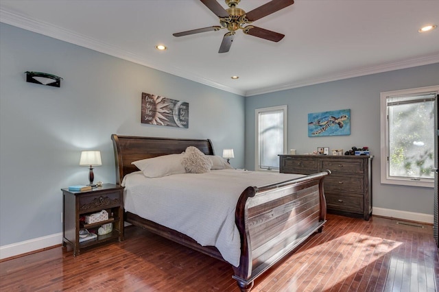 bedroom featuring crown molding, recessed lighting, dark wood finished floors, and baseboards