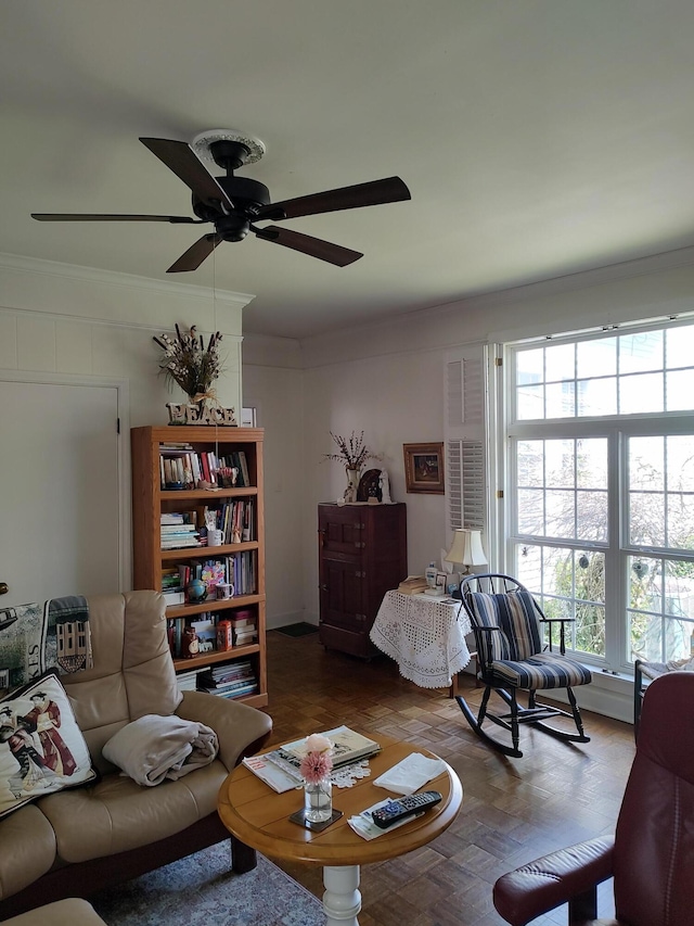 206 S Alexander Ave, Washington, GA 30673 - living area featuring ceiling fan, plenty of natural light, and ornamental molding