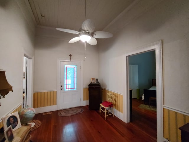 206 S Alexander Ave, Washington, GA 30673 - foyer featuring wainscoting, ceiling fan, and wood-type flooring