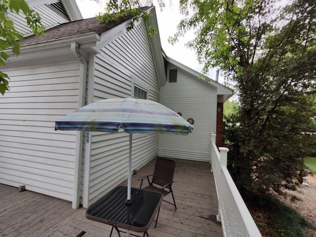 206 S Alexander Ave, Washington, GA 30673 - view of property exterior with a deck and roof with shingles