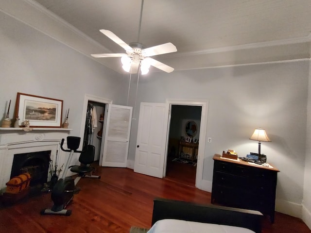 206 S Alexander Ave, Washington, GA 30673 - bedroom featuring a ceiling fan, wood finished floors, and a fireplace