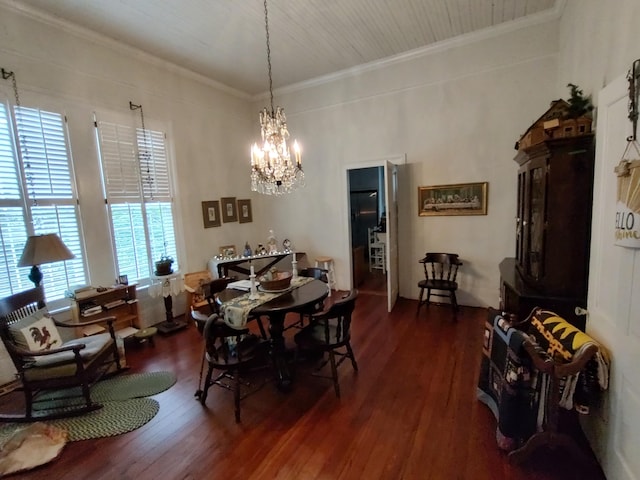 206 S Alexander Ave, Washington, GA 30673 - dining room with ornamental molding, wood finished floors, and a notable chandelier