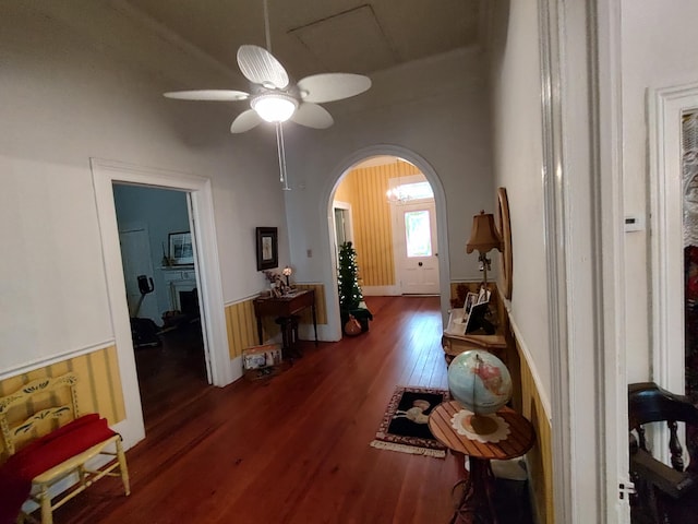206 S Alexander Ave, Washington, GA 30673 - foyer featuring wood finished floors, a ceiling fan, and arched walkways