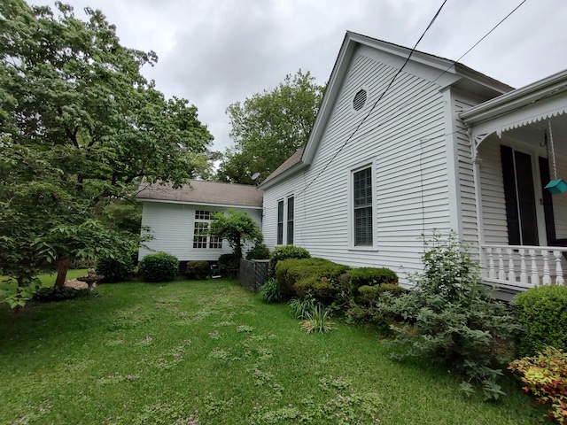 206 S Alexander Ave, Washington, GA 30673 - view of property exterior with a lawn