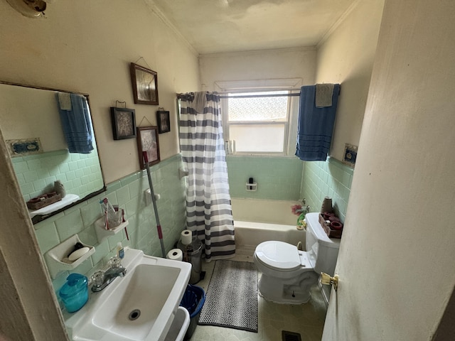 2916 Whistler Ln, Augusta, GA 30906 - full bath with tile walls, ornamental molding, shower / bathtub combination with curtain, wainscoting, and tile patterned floors