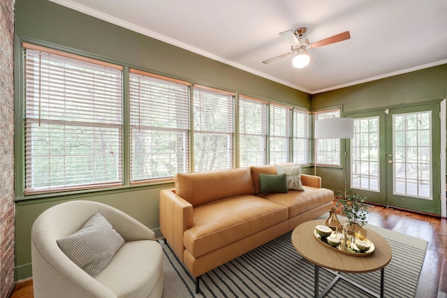 4142 Rivermont Dr, Evans, GA 30809 - sunroom with french doors, wood finished floors, crown molding, and brick wall