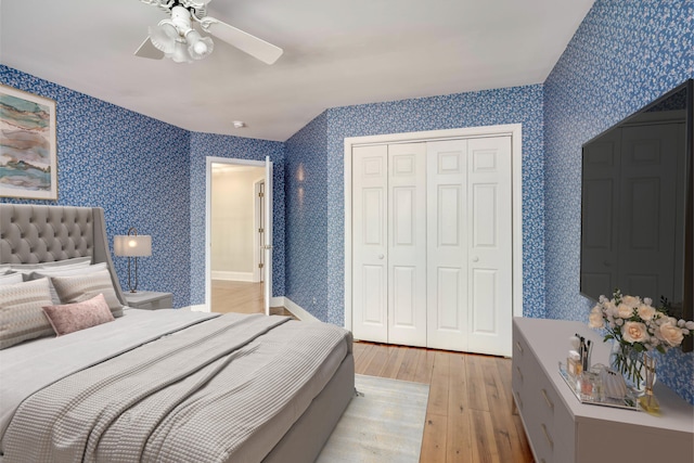 4142 Rivermont Dr, Evans, GA 30809 - bedroom with light wood-style flooring, wallpapered walls, a closet, and ceiling fan