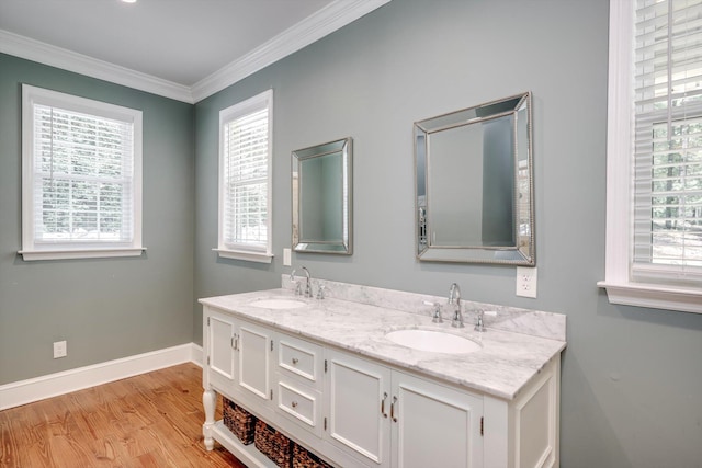 4142 Rivermont Dr, Evans, GA 30809 - bathroom with double vanity, wood finished floors, and ornamental molding